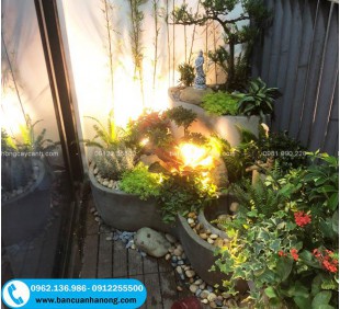 Set up bể cá cảnh bằng đá mài tại ban công